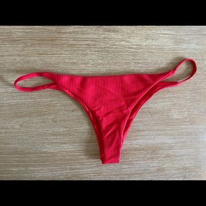 Frankie’s red bikini bottoms